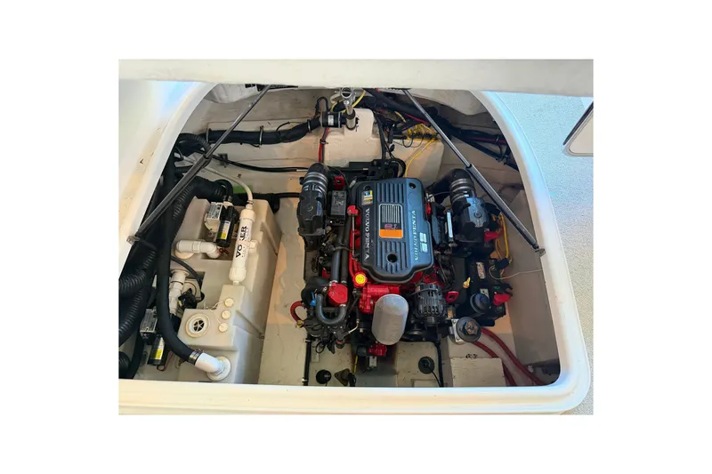 Slide: The Image of Engine compartment of a 2008 Chaparral Signature 270 boat, featuring a Volvo Penta engine. - 22