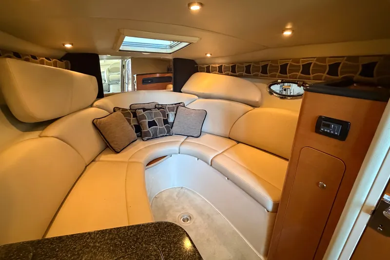Slide: The Image of Luxurious interior of 2008 Chaparral Signature 270 boat with plush seating and elegant decor. - 37