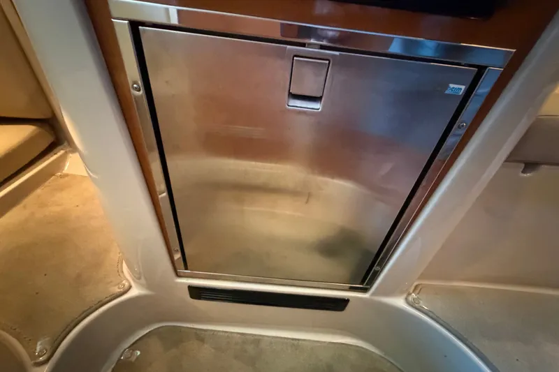 Slide: The Image of Stainless steel refrigerator in 2008 Chaparral Signature 270 boat interior. - 32