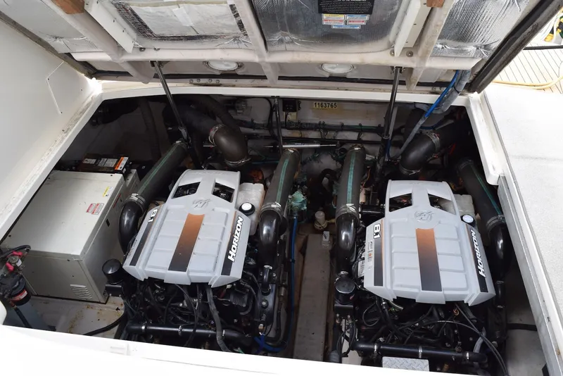 Slide: The Image of Engine compartment of a 2004 Sea Ray 390 Sundancer with twin Horizon engines. - 35