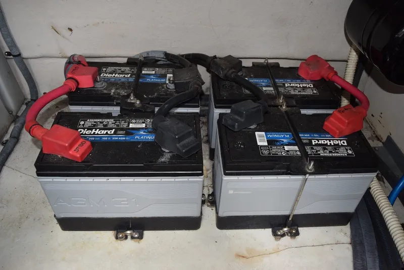 Slide: The Image of Four DieHard AGM batteries in a 2004 Sea Ray 390 Sundancer boat. - 39