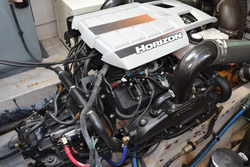 Slide: The Image of Engine compartment of a 2004 Sea Ray 390 Sundancer with Horizon engine. - 36
