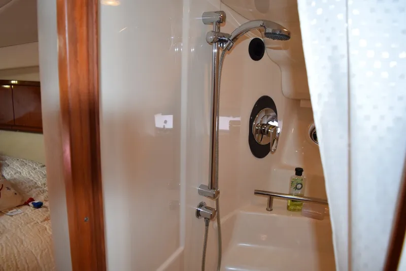Slide: The Image of Shower area in 2004 Sea Ray 390 Sundancer yacht with modern fixtures. - 32