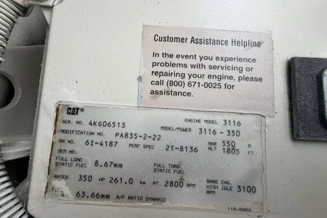 Slide: The Image of Engine specifications and customer assistance details for 1997 Sea Ray Sundancer 400. - 40