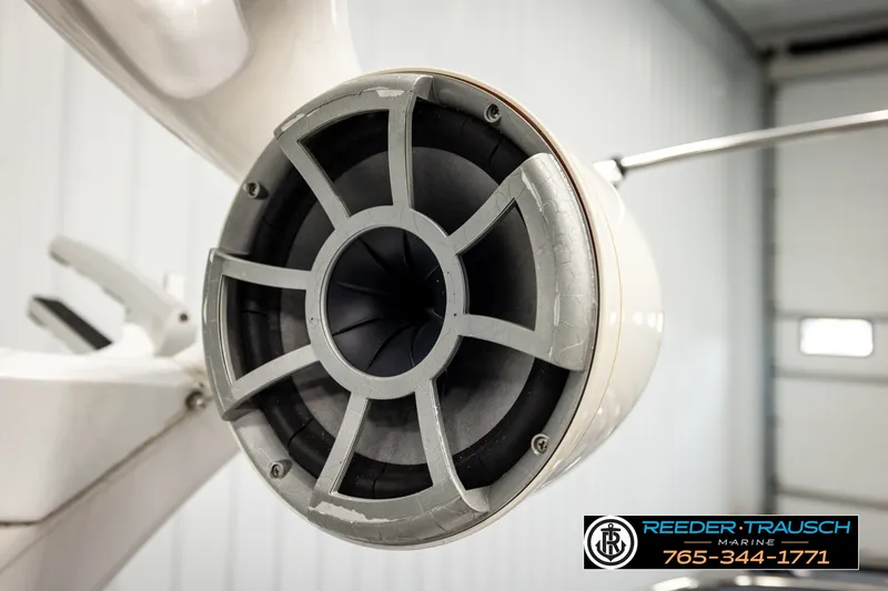 Slide: The Image of Close-up of a 2013 Tigé RZR boat speaker in a showroom setting. - 45