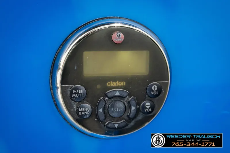 Slide: The Image of Control panel of a 2013 Tigé RZR boat with Clarion audio system. - 50