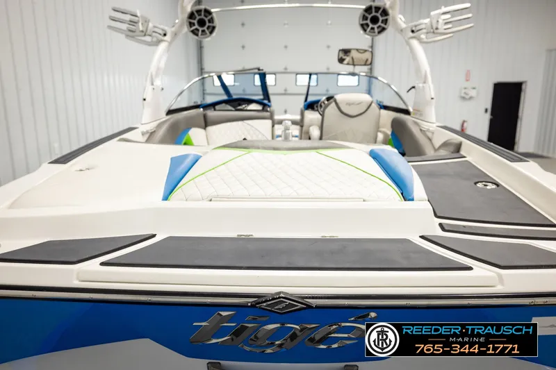 Slide: The Image of 2013 Tigé RZR boat interior with sleek design and modern features. - 47