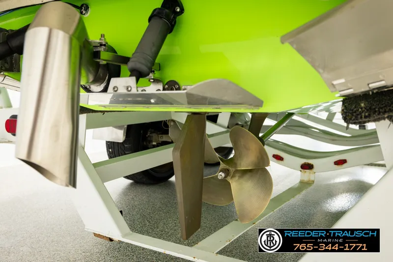 Slide: The Image of 2013 Tigé RZR boat propeller and exhaust system on trailer, Reeder-Trausch Marine. - 51