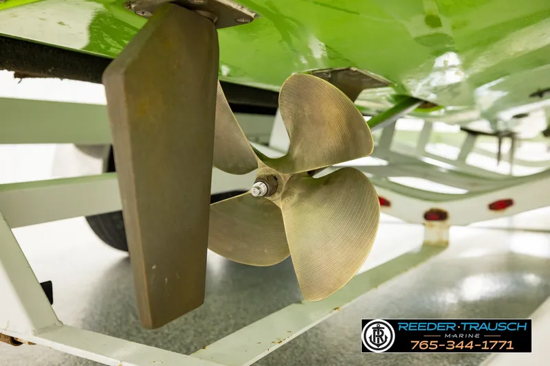 Slide: The Image of Propeller of a 2013 Tigé RZR boat on a trailer, Reeder Trausch Marine. - 52