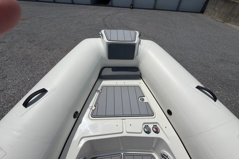 Slide: The Image of 2027 Brig Eagle 8 inflatable boat interior with seating and storage compartments. - 26