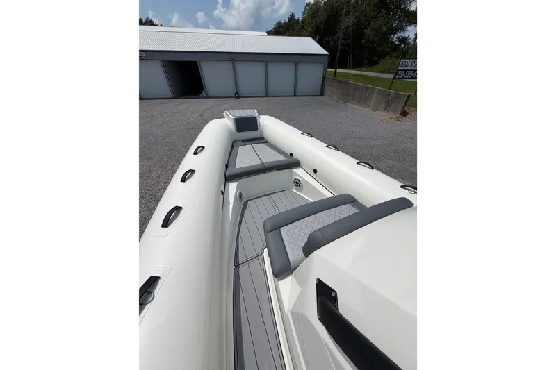 Slide: The Image of 2027 Brig Eagle 8 boat interior with sleek seating and modern design. - 25
