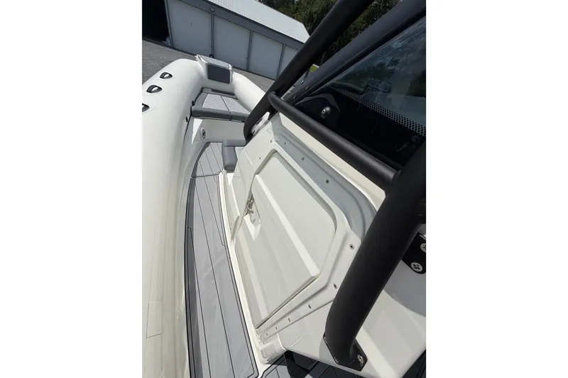 Slide: The Image of 2027 Brig Eagle 8 boat deck with sleek design and modern features. - 23