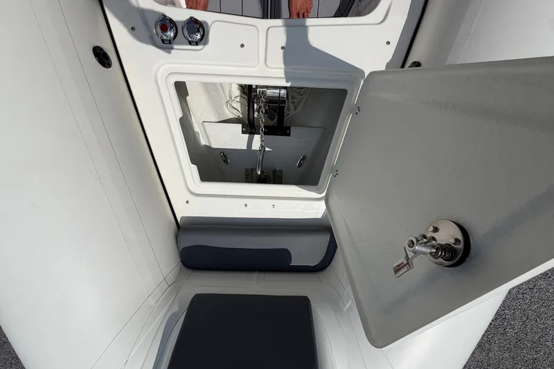 Slide: The Image of Interior view of 2027 Brig Eagle 8 boat showing storage compartment and seating. - 29