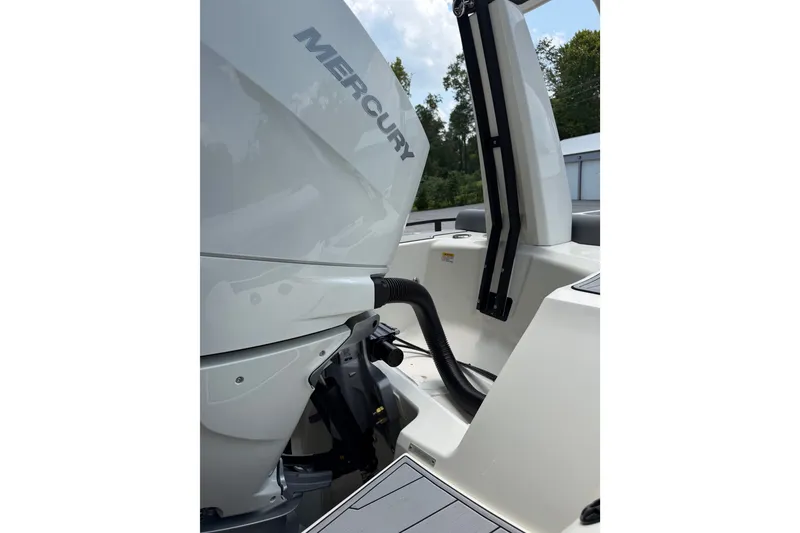 Slide: The Image of 2027 Brig Eagle 8 boat with Mercury engine, close-up view. - 35