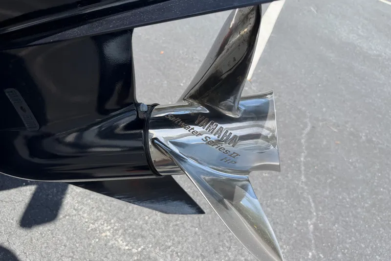Slide: The Image of Close-up of Yamaha Saltwater Series II propeller on 2023 Robalo 226 Cayman boat. - 16