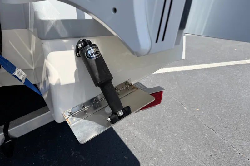 Slide: The Image of 2023 Robalo 226 Cayman boat with Lenco trim tab detail. - 18