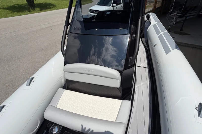 Slide: The Image of 2027 Brig Eagle 8 boat interior with sleek seating and modern design. - 21