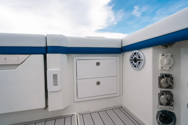 Slide: The Image of 2026 Formula 387 Center Console Fish boat interior with storage and speaker. - 30