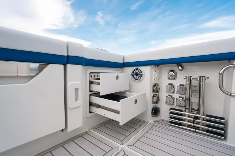 Slide: The Image of 2026 Formula 387 Center Console Fish boat interior with storage drawers and equipment. - 31