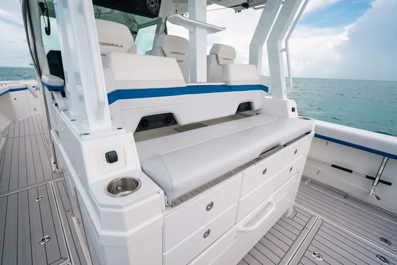 Slide: The Image of 2026 Formula 387 Center Console Fish boat interior with seating and ocean view. - 42
