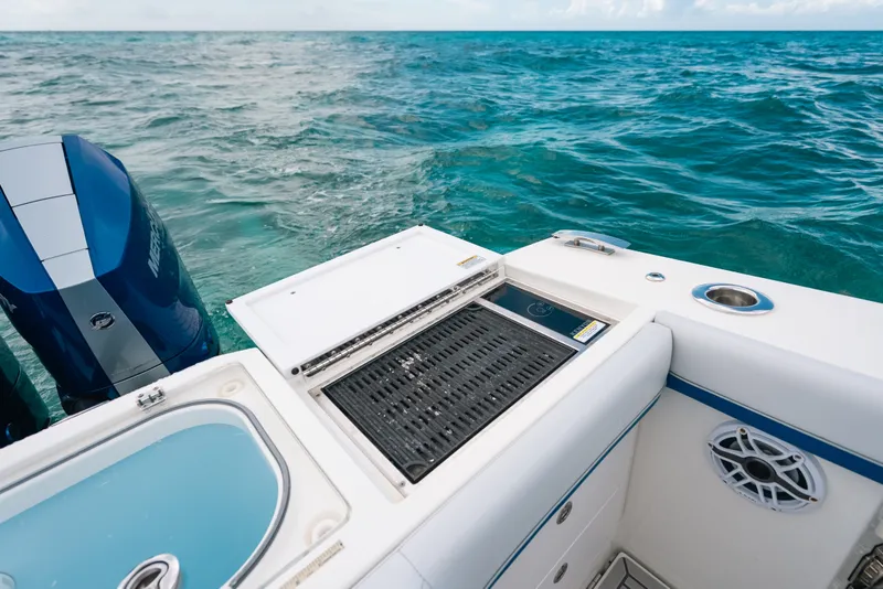 Slide: The Image of 2026 Formula 387 Center Console Fish boat with grill and ocean view. - 32