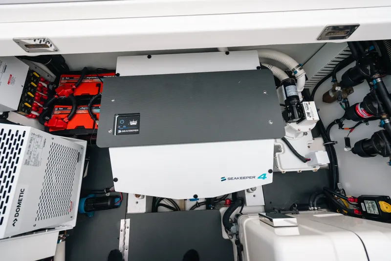 Slide: The Image of Engine compartment of 2026 Formula 387 Center Console Fish with Seakeeper 4 stabilizer. - 39