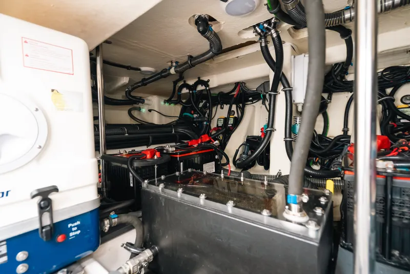 Slide: The Image of Engine room of 2026 Formula 387 Center Console Fish, showcasing complex wiring and components. - 36
