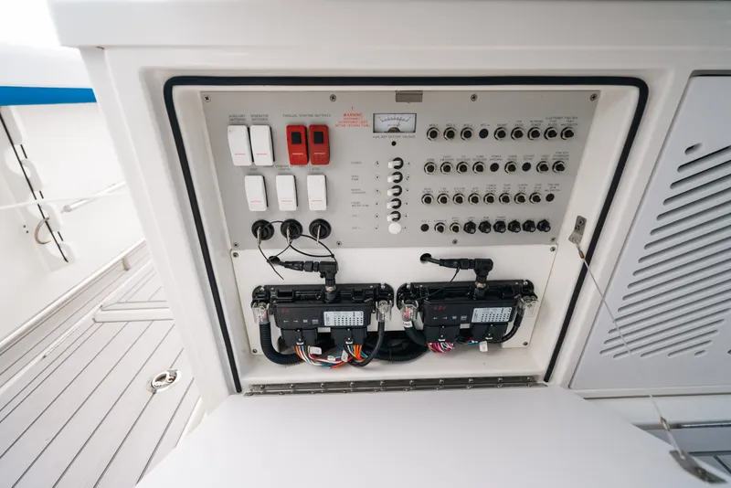 Slide: The Image of Electrical panel of 2026 Formula 387 Center Console Fish boat, showcasing switches and wiring. - 50