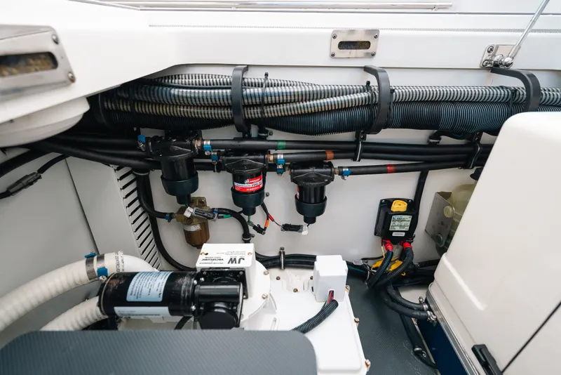 Slide: The Image of Engine compartment of 2026 Formula 387 Center Console Fish, showcasing wiring and components. - 37