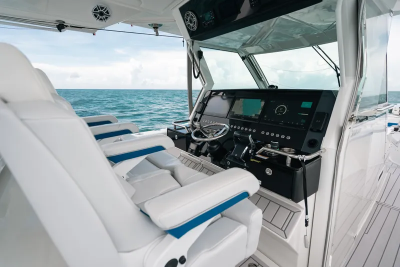 Slide: The Image of 2026 Formula 387 Center Console Fish boat interior with advanced navigation system. - 51