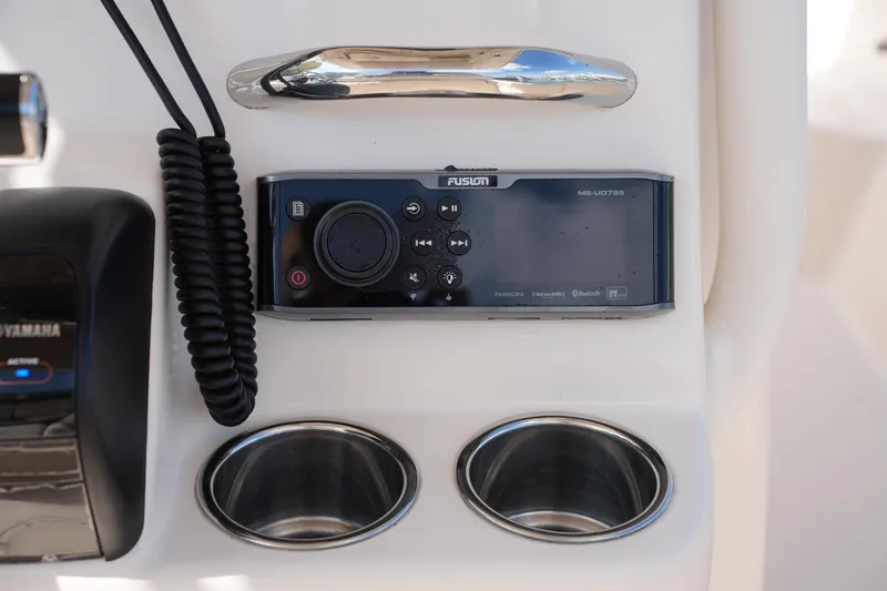 Slide: The Image of Control panel on 2017 Grady-White Fisherman 236 boat with Fusion audio system. - 23