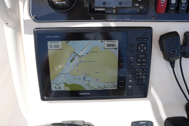 Slide: The Image of Garmin GPS display on 2017 Grady-White Fisherman 236 boat dashboard. - 25
