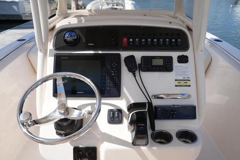 Slide: The Image of Control panel of a 2017 Grady-White Fisherman 236 boat with navigation equipment. - 20