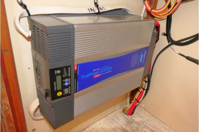 Slide: The Image of Inverter installation on a 2001 Hunter 420 boat, featuring TruePower 2000 series. - 84