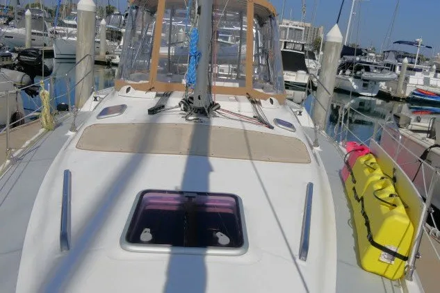Slide: The Image of Sailboat deck view of 2001 Hunter 420 model in marina setting. - 75