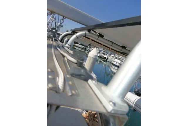 Slide: The Image of Close-up of a 2001 Hunter 420 sailboat's rigging and deck at a marina. - 69