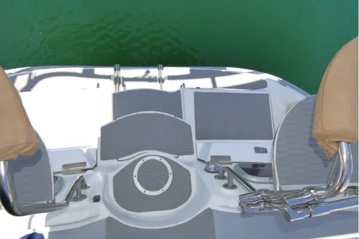 Slide: The Image of Rear deck of a 2001 Hunter 420 sailboat with seating and water access. - 59