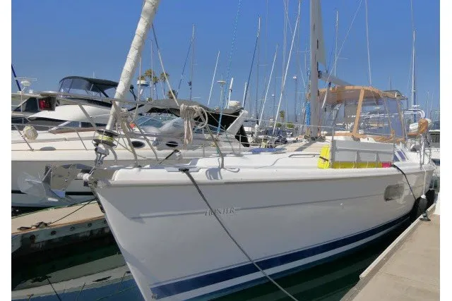 Slide: The Image of Sailboat docked at marina, 2001 Hunter 420 model, clear blue sky. - 100
