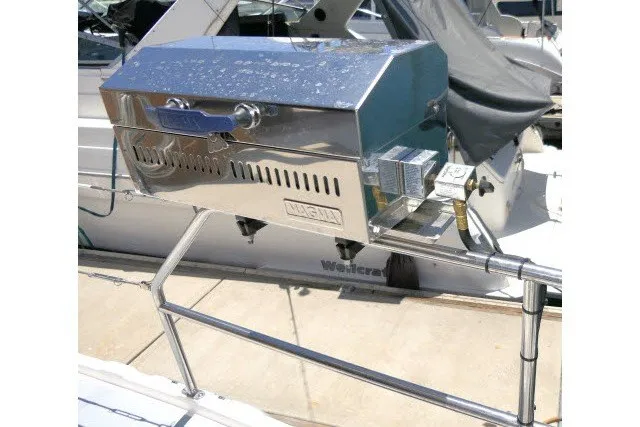 Slide: The Image of Stainless steel grill mounted on a 2001 Hunter 420 sailboat deck. - 58
