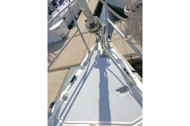 Slide: The Image of Bow view of 2001 Hunter 420 sailboat docked at marina. - 72