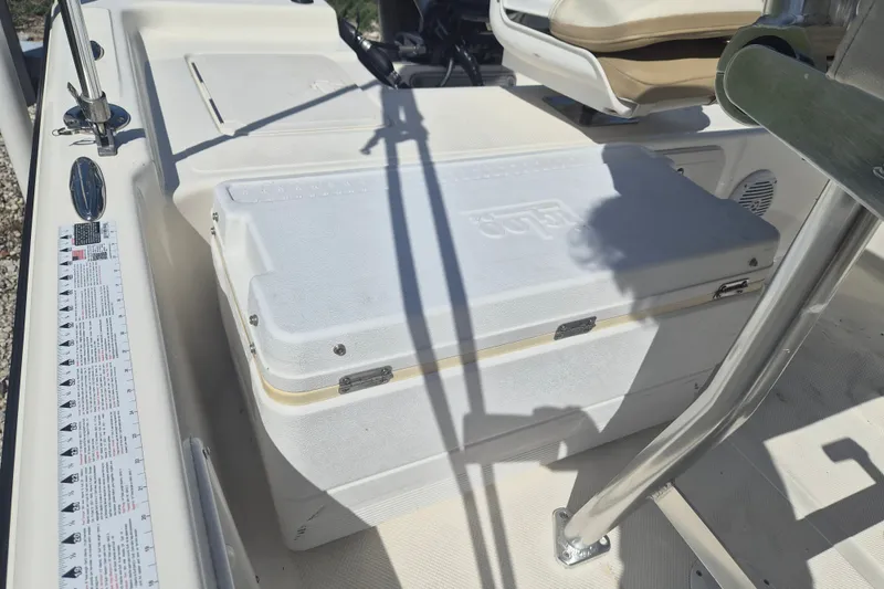 Slide: The Image of 2017 Key West 176 Bay Reef boat interior with cooler and seating area. - 10