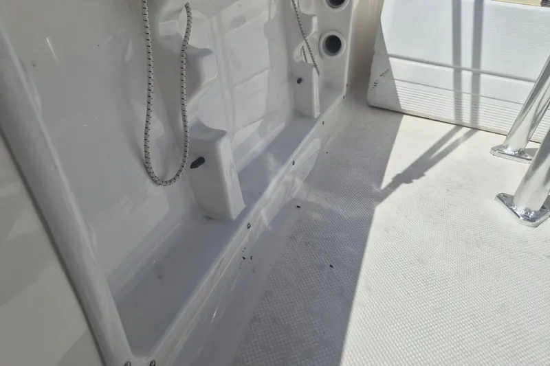 Slide: The Image of Interior view of a 2017 Key West 176 Bay Reef boat, showing deck and fittings. - 16