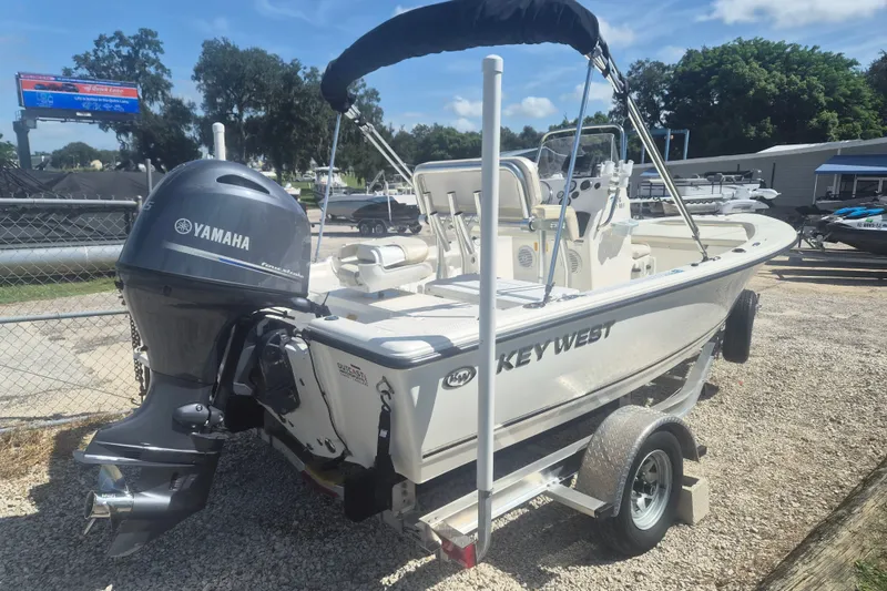 Slide: The Image of 2017 Key West 176 Bay Reef boat with Yamaha engine on trailer. - 2