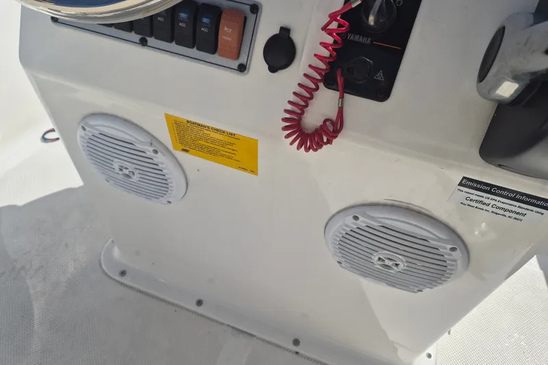 Slide: The Image of 2017 Key West 176 Bay Reef boat console with speakers and control panel. - 15