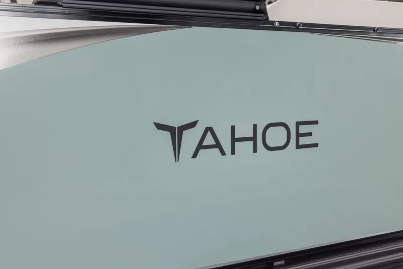 Slide: The Image of 2026 Tahoe Pontoon LTZ Quad Lounger Shift 23 logo on boat exterior. - 3