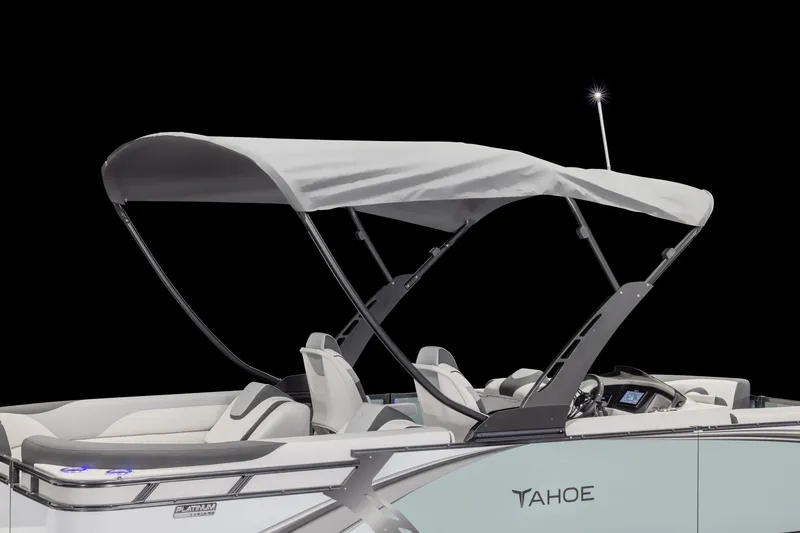 Slide: The Image of 2026 Tahoe Pontoon LTZ Quad Lounger Shift 23 with canopy and sleek design. - 4