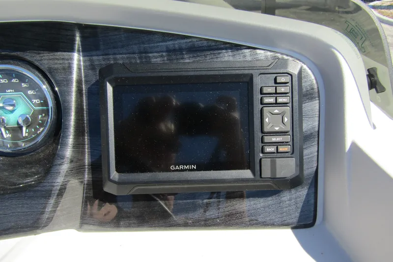 Slide: The Image of Dashboard of 2026 Tahoe Pontoon LTZ Quad Lounger Shift 23 with Garmin display. - 20