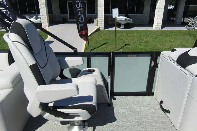 Slide: The Image of 2026 Tahoe Pontoon LTZ Quad Lounger Shift 23 interior with luxurious seating and modern design. - 23