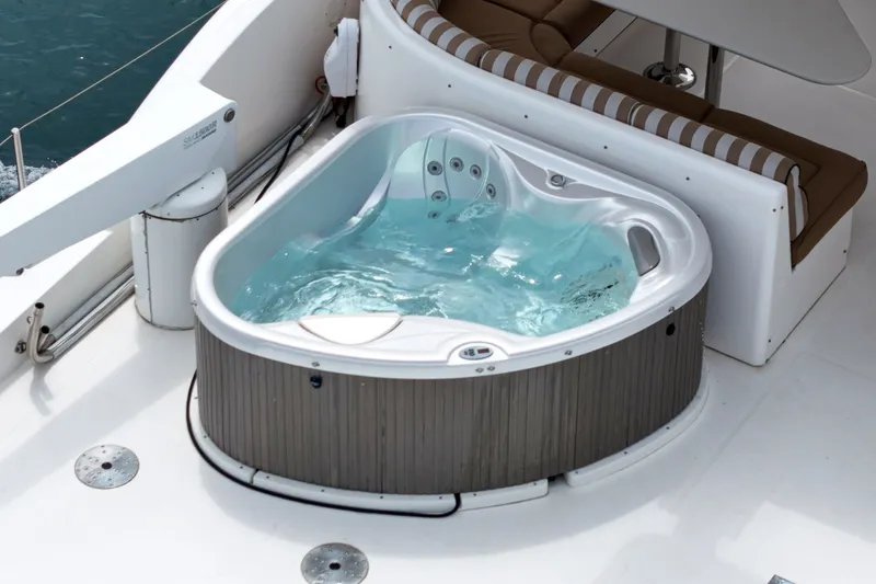 Slide: The Image of A hot tub on the deck of a 2005 West Bay 80 CPMY yacht. - 20