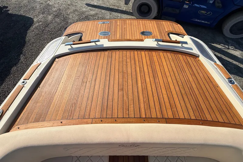 Slide: The Image of 2018 Chris-Craft Launch 30 boat with elegant wooden deck and sleek design. - 2